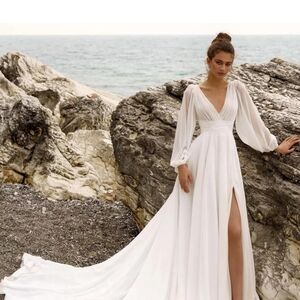 Chic White Bridal Gown with Flowing Train